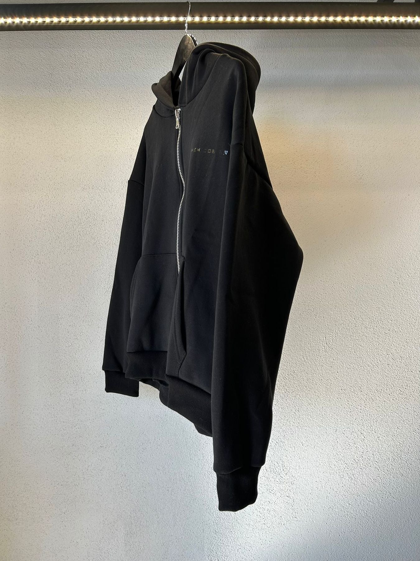 FELPA OVERSIZE CON ZIP E CAPPUCCIO