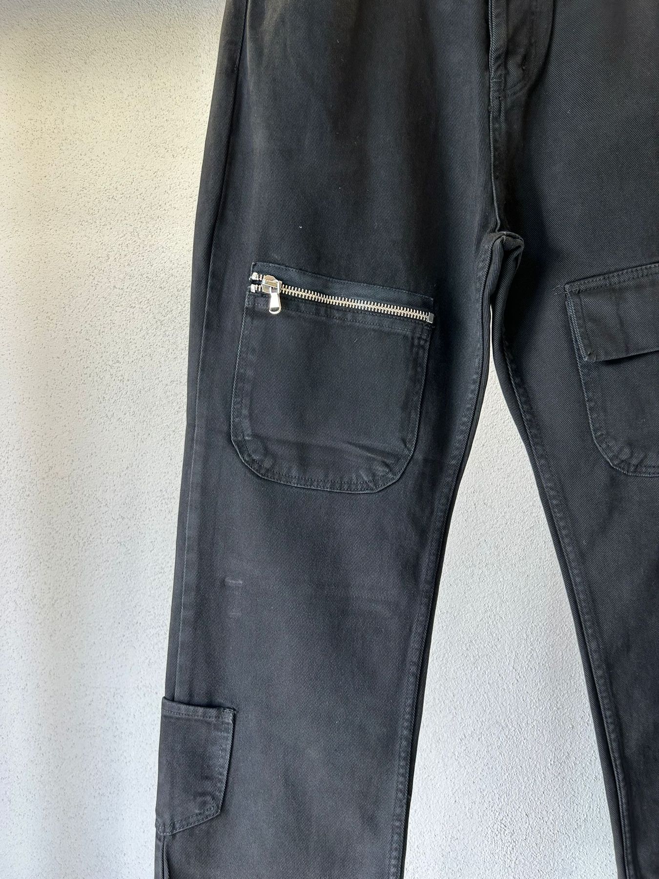 JEANS CARGO LOOSE FIT CON ZIP